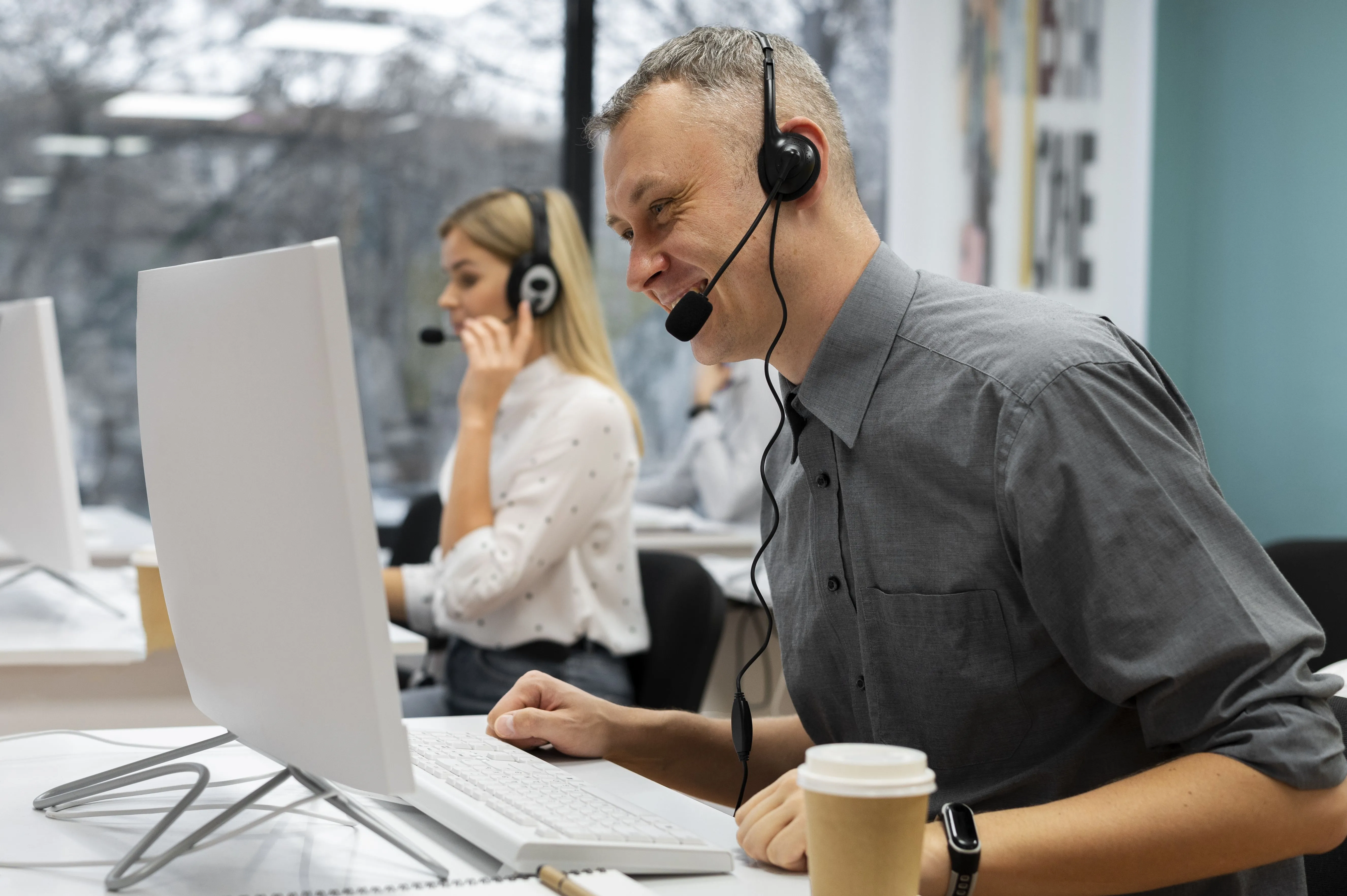 colleagues working together call center office with coffee